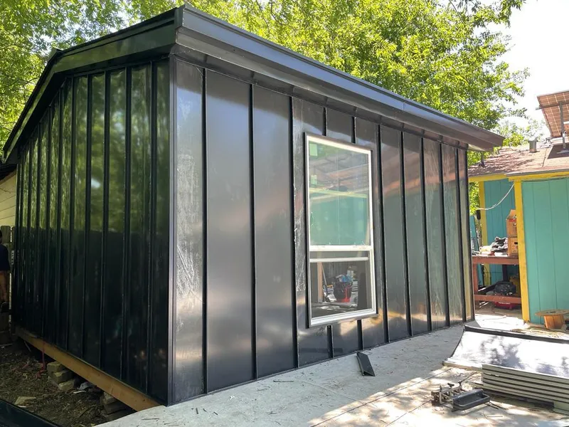 Black standing seam metal wall panels for Roof Inspection in Barton