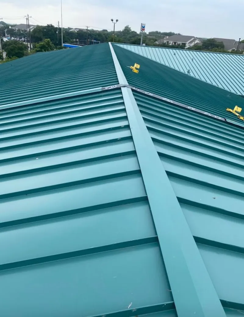 Green commercial metal roof ridge and valley for Metal Roof Repair in Barton